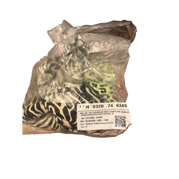 Fabletics NWT On-The-Go Medium Impact Sports Bra in Marbled Zebra Wavy Cheetah - Picture 2 of 5